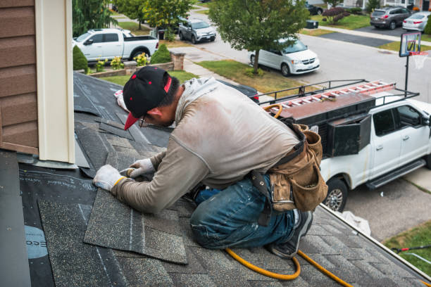 Professional Roofing technician working in Hightstown, NJ